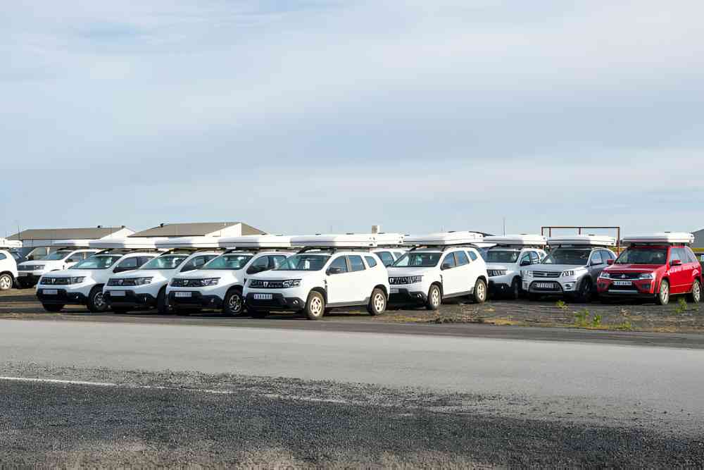 Keflavik Airport Iceland Rental cars with rooftop tents parked