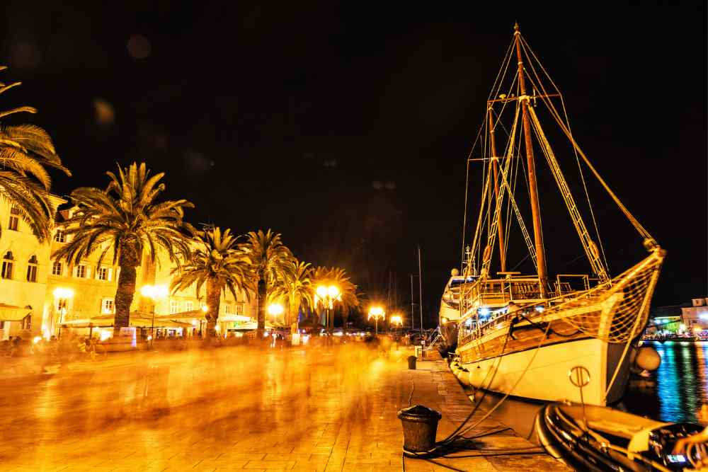 Promenade in harbor, Trogir, Croatia, night scene