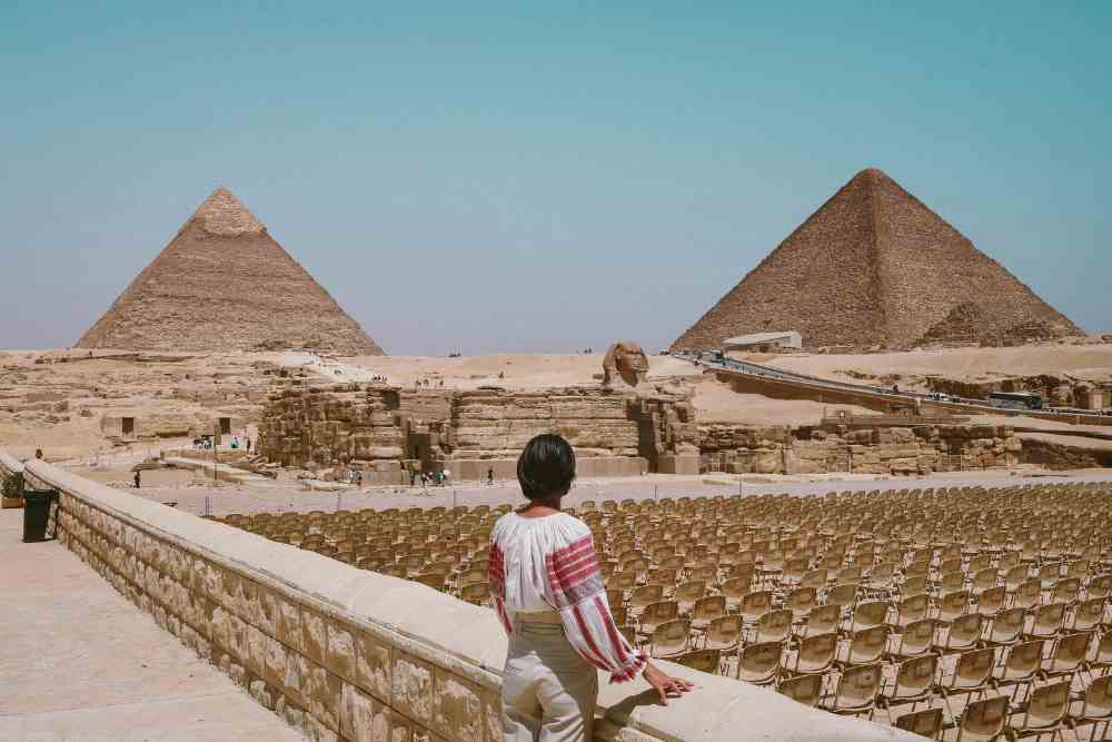 Woman Looking At Pyramids, Great Sphinx Of Giza, Egypt